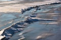 Ice and snow on the surface of a frozen lake Royalty Free Stock Photo