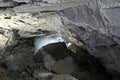 Ice stalactites, stalagmites and columns in cave