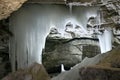 Ice stalactites, stalagmites and columns in cave