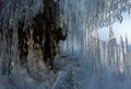 Ice stalactites and stalagmites in the rock. Royalty Free Stock Photo