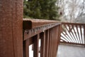 Ice Storm Icicles Formed on a Deck Railing