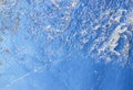 Ice structure plate on a blue background from the refrigeration equipment, cool in the summer heat