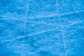 Ice surface in sports arena for figure skating or hockey. Ice background and ice texture is cut with pattern and Royalty Free Stock Photo