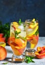 Ice tea with peach and lemon. Cold drink. Royalty Free Stock Photo