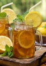 Ice tea in two glass jars with lemon and mint Royalty Free Stock Photo