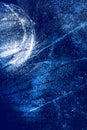 Ice texture with frozen bubbles and cracks on a dark blue background. Beautiful abstract decorative background. Stylish abstract Royalty Free Stock Photo