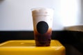 Ice thai tea in the plastic cup. Royalty Free Stock Photo