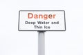 Ice thin and deep water danger sign in sky Royalty Free Stock Photo