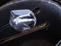 Ice tongs with Ice cubes, Water drops, Close up & Macro shot, Selective focus, Healthy Drink concept Royalty Free Stock Photo