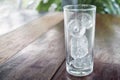 Ice tube in glass on table Royalty Free Stock Photo