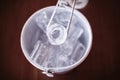 The Ice was taken out from silver bucket. On a dark wood background Royalty Free Stock Photo