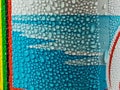 ice water drops on colorful aluminum cans.