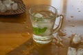Ice water with fresh mint leaves close up Royalty Free Stock Photo