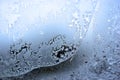 Ice on the window glass, natural background texture close-up Royalty Free Stock Photo