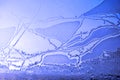 Ice on the window glass, natural background texture close-up Royalty Free Stock Photo