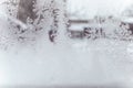 Ice on a window. Winter ice frost, frozen background. frosted window glass texture. Cold cool icicles background