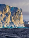 Iceberg in Antarctic ocean at sunset Royalty Free Stock Photo