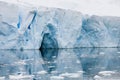 Iceberg in Antarctica, huge table iceberg, tabular iceberg with gate and reflections Royalty Free Stock Photo