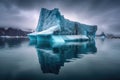 iceberg floating away from glacier terminus