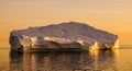 Iceberg in Greenland during sunset.