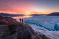 Iceberg hikers glacier sunset. Generate Ai