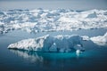 Iceberg and ice from glacier in arctic nature landscape in Ilulissat,Greenland. Aerial drone photo of icebergs in Royalty Free Stock Photo
