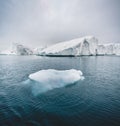 Iceberg and ice from glacier in arctic nature landscape in Ilulissat,Greenland. Aerial drone photo of icebergs in