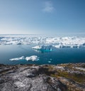 Iceberg and ice from glacier in arctic nature landscape in Ilulissat,Greenland. Aerial drone photo of icebergs in Royalty Free Stock Photo
