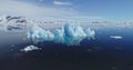 Iceberg ocean reflection aerial. Environment preserve at climate change concept. Antarctica seascape