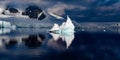 Iceberg shining in white, turquoise color at first morning sunlight in dark blue riffled Southern Antarctic Ocean, Antarctica