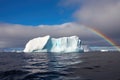 iceberg under a rainbow