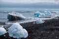 Icebergs at the black beach, Iceland, on a  summer day Royalty Free Stock Photo