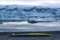 Icebergs with candles and serf board during the annual firework show at ice lagoon Jokulsarlon, Iceland Royalty Free Stock Photo