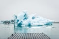 Icebergs floating in the Jokulsarlon lagoon on Iceland with a br