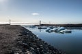 Icebergs floating under a bridge