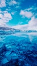 Icebergs floating in the water under a blue sky Royalty Free Stock Photo