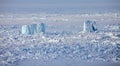 Icebergs in frozen Arctic Ocean