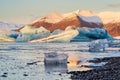 Icebergs in the Jokulsarlon lake at sunrise, Iceland Royalty Free Stock Photo