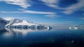 Icebergs reflecting in the calm Paradise Bay in Antarctica. Royalty Free Stock Photo