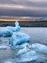 Icebergs in a spectacular glacial lagoon at sunset Jokusarlon, Iceland