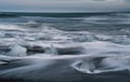 Icebergs from Vatnajokull glacier, drop into Jokulsarlon lake and then to the Ice beach Iceland. Global warming