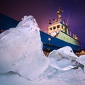 The Icebreaker ship trapped in ice tries to break and leave the