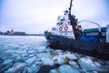 The Icebreaker ship trapped in ice tries to break and leave the