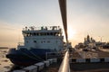 Icebreakers on the background of the sunset. Ice-drift on the Northern Dvina. Mikhailo-Archangel Cathedral