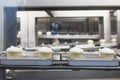 Icecream automatic production line - conveyor belt with ice cream cones at modern food processing factory. Food dairy industry, Royalty Free Stock Photo