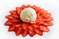 Icecream on flower-shaped strawberries slices