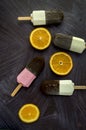 Icecreams and orange slices Royalty Free Stock Photo