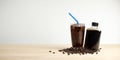 Iced americano coffee with coffee beans on grey background, Black coffee glass package for takeaway.