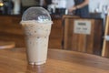 Iced Americano coffee in take away cup plastic glass on the wo Royalty Free Stock Photo