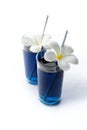 Iced blue butterfly pea drinks tropical flowers decor. Healthy thai traditional cocktails in glasses